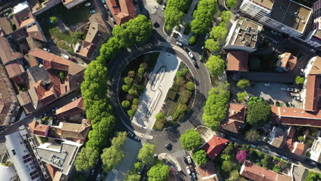 Circular-movement-vertical-aerial-view-over-a-roundabout-with-trees-in-Nîmes